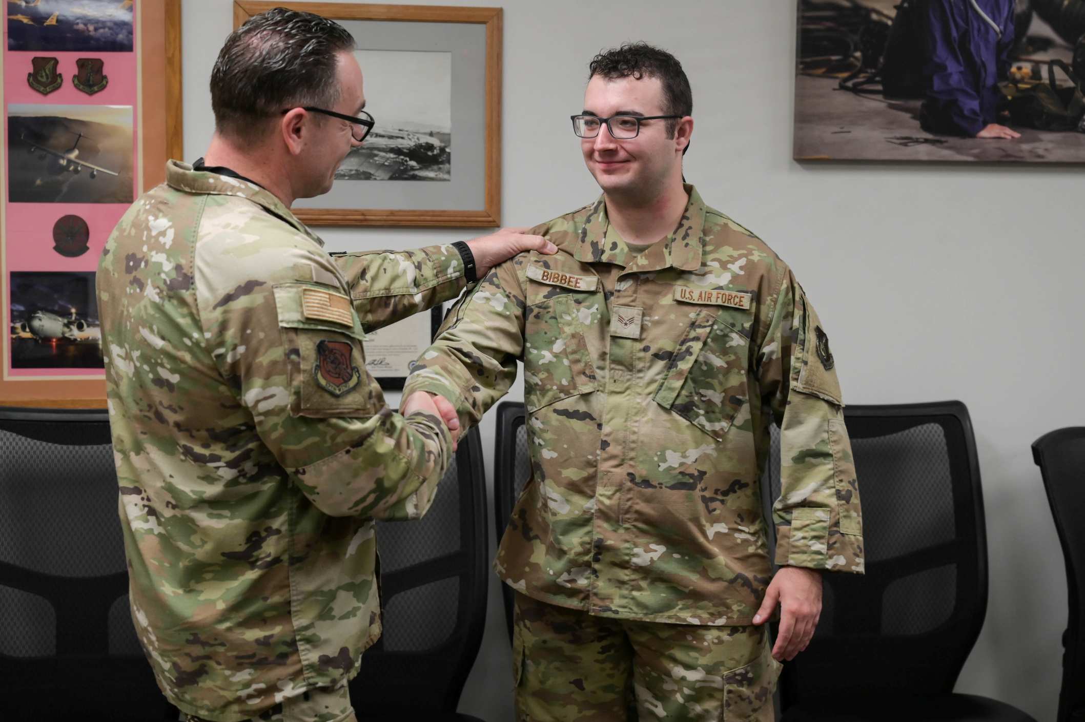 Commander Congbratulating Soldier
