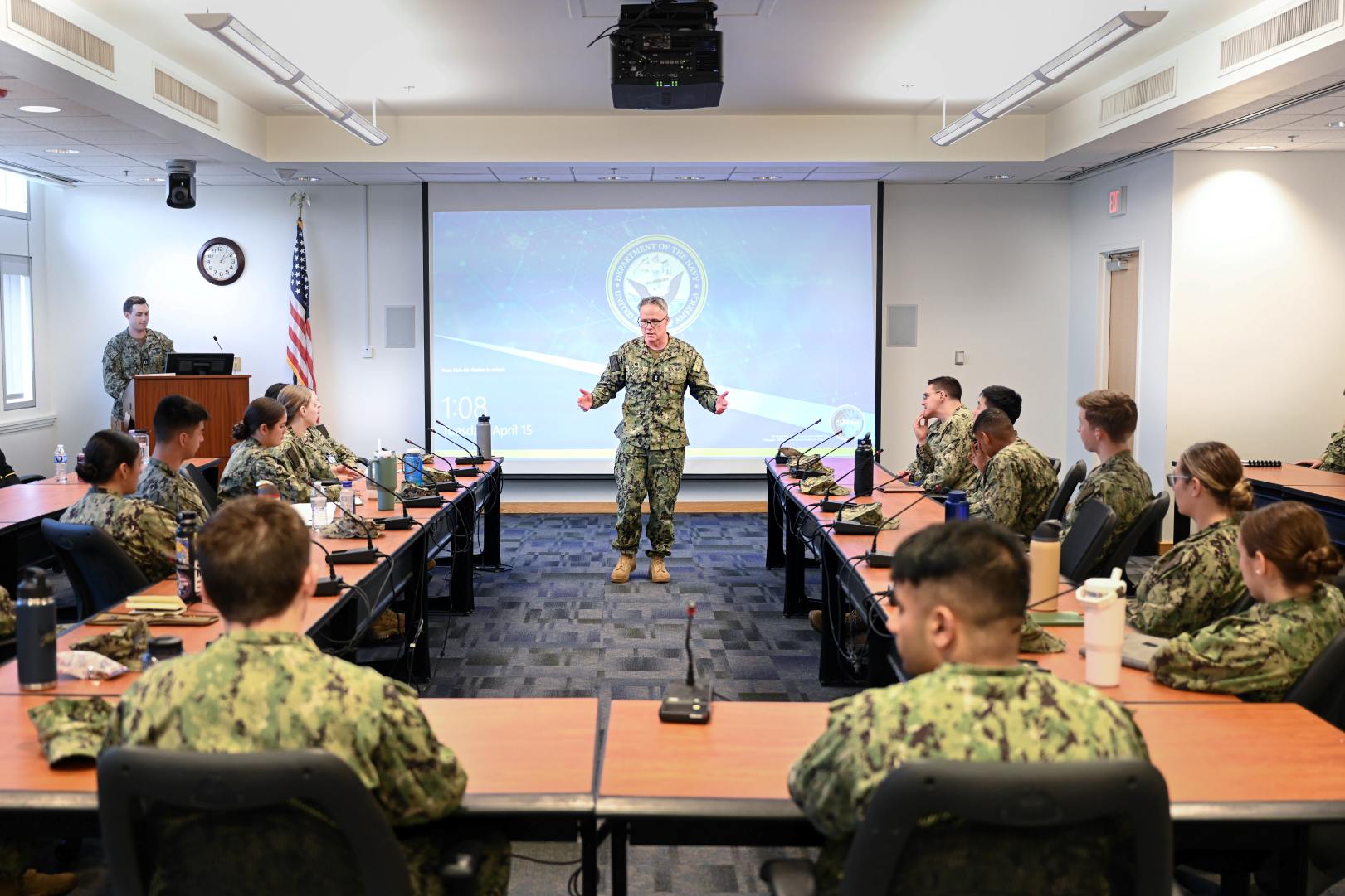 Navy Commander Giving a Briefing