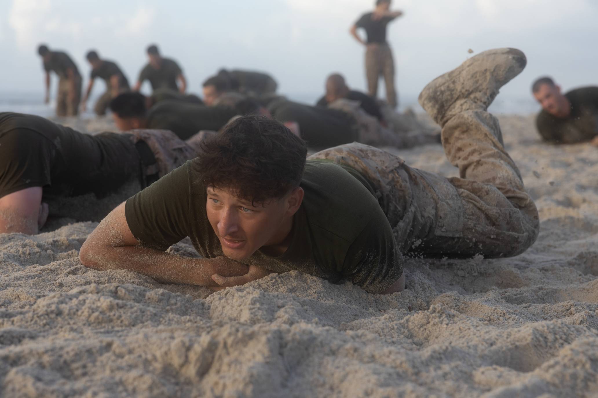 Soldiers Doing Group Workout On Beach